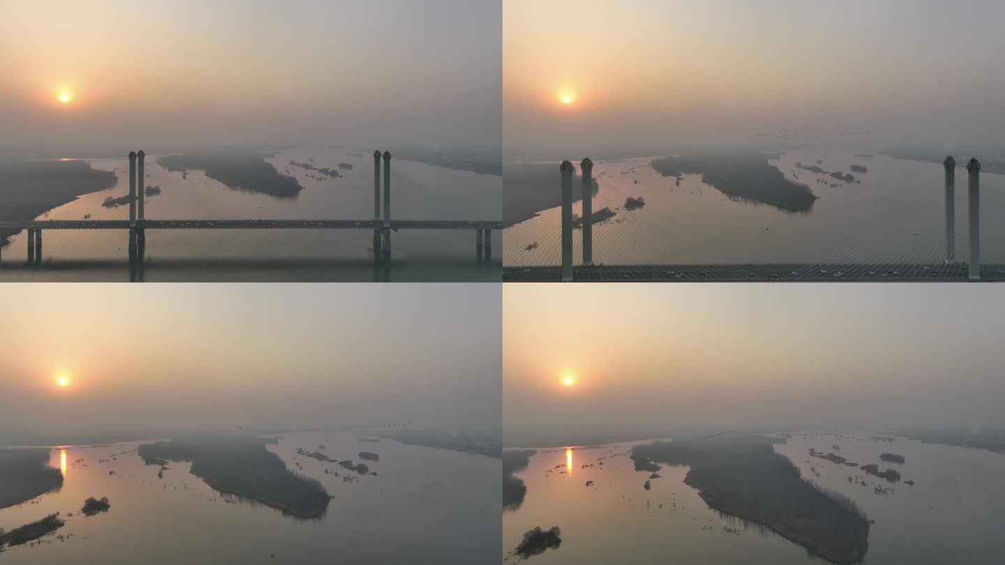 航拍候鸟群飞过襄阳汉江卧龙大桥城市风光