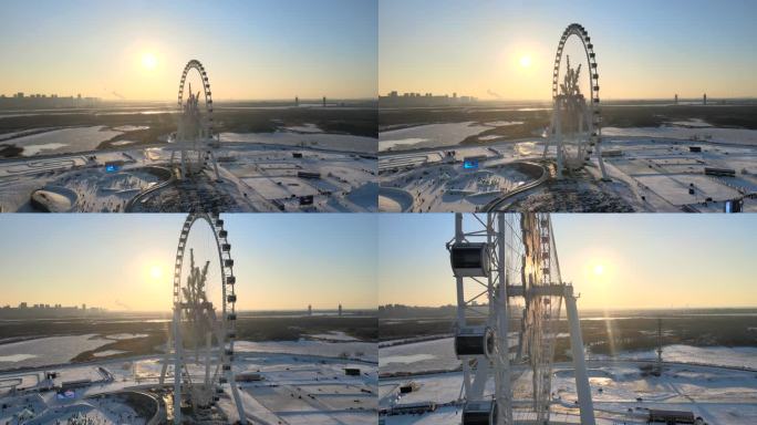 哈尔滨冰雪大世界夕阳下的摩天轮 雪花