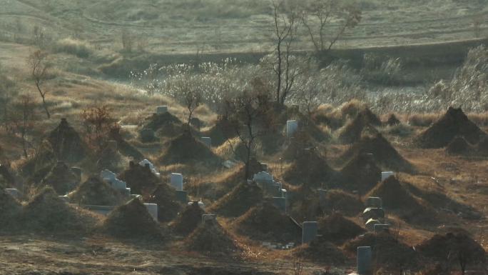 航拍农村田野土葬坟场坟头坟墓墓地