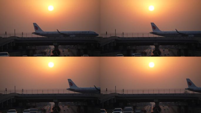 双流机场日落下的飞机