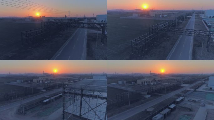 大型工厂下的夕阳