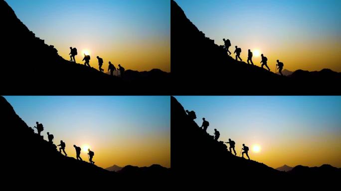 一群人登山剪影阳光青春少年攀登顶峰探险者