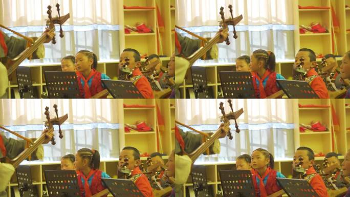 音乐器具 音乐实践 拉琴 小学生学唱歌