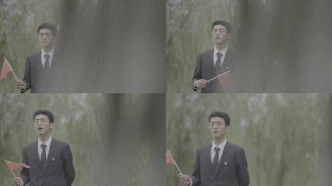 【4K灰度】正装男子唱歌手摇红旗