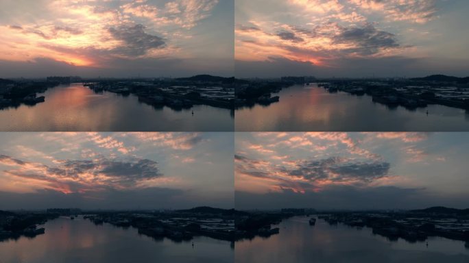 黄昏日落船在河上的延时