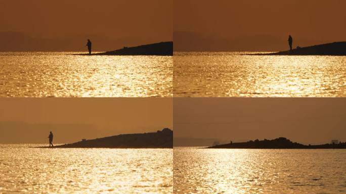 长江边橙色的阳光下钓鱼者甩竿钓鱼波光粼粼