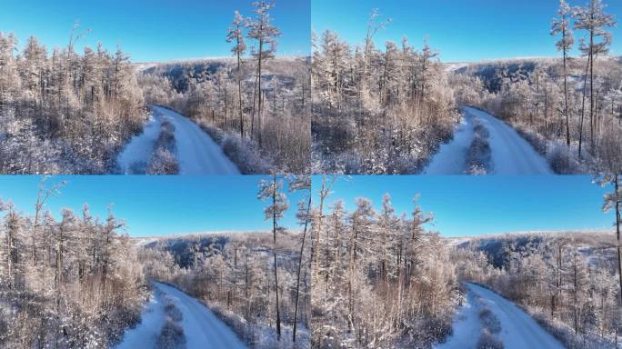 航拍林海雪原雪林山路