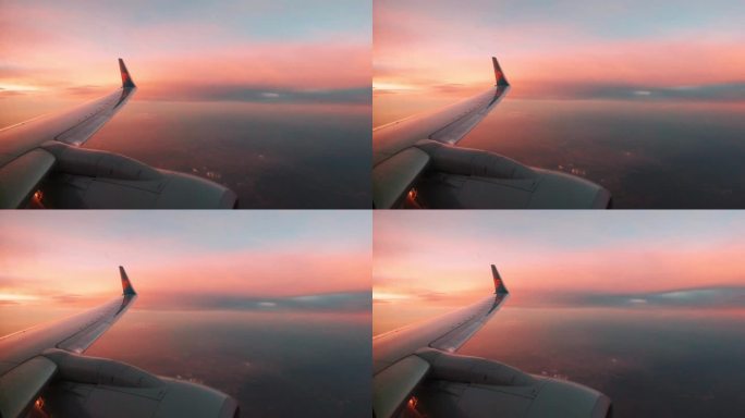 飞机窗外的日落美景
