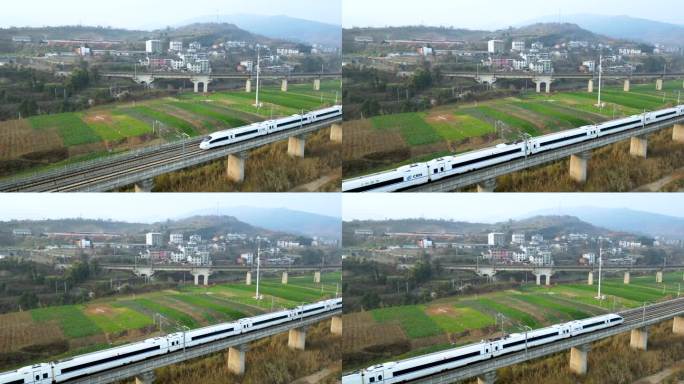 广元立交桥上行驶中的高铁与车流交通