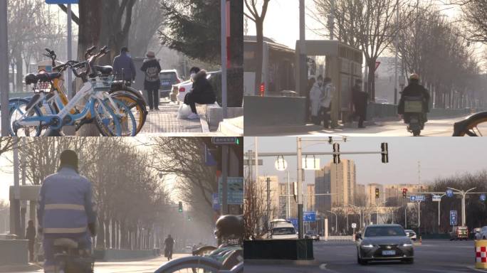 城市街道冬天骑行车流都市生活忙忙碌碌的人