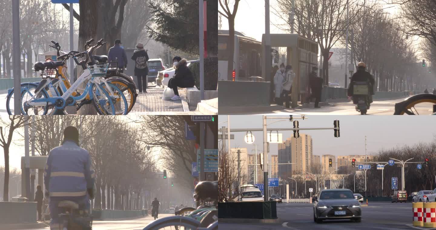 城市街道冬天骑行车流都市生活忙忙碌碌的人