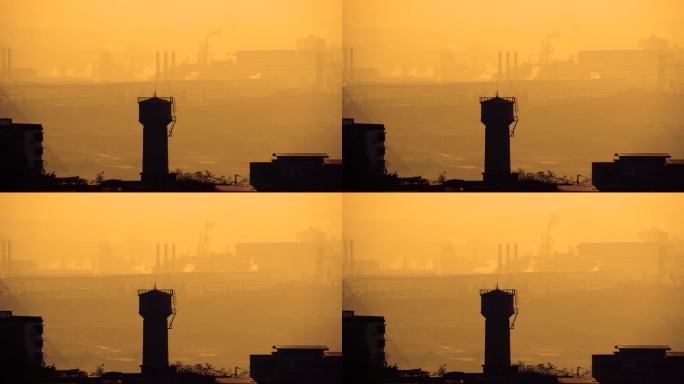 4k夕阳下的工厂工业烟囱能源排放浓烟滚滚