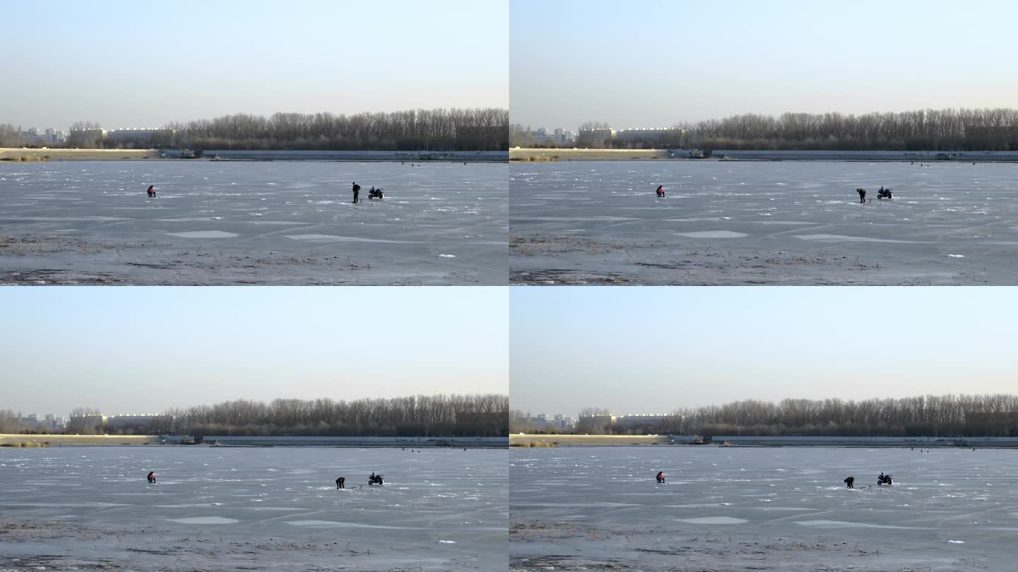 冬天冰上钓鱼游玩