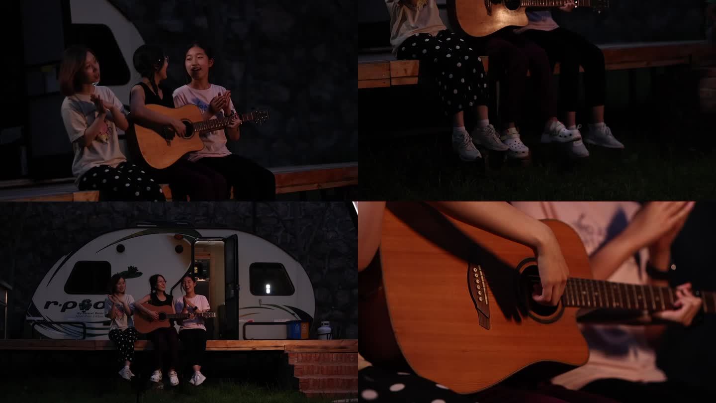 晚上野外露营弹吉他唱歌的青春女生