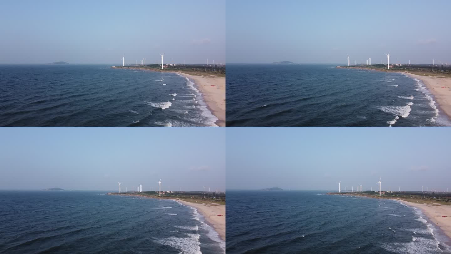 航拍山东威海海岸线公路风车唯美风光