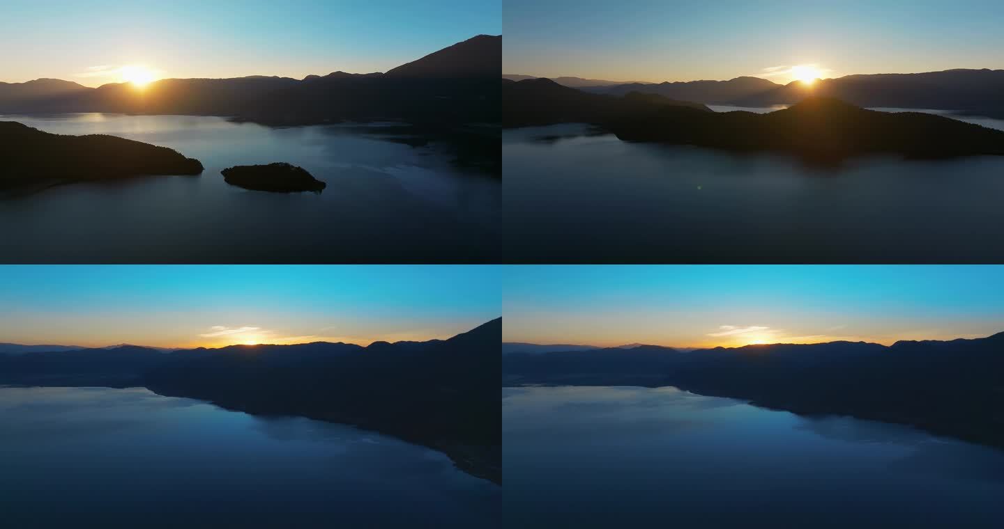 航拍泸沽湖日出绝美蓝天水面岛屿梦幻色彩