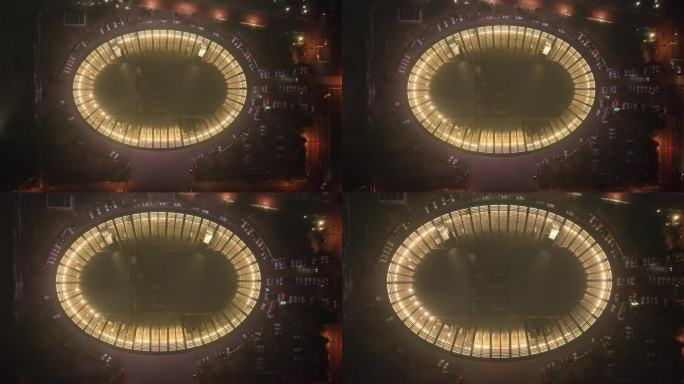航拍俯瞰夜色中的荣成市体育场馆