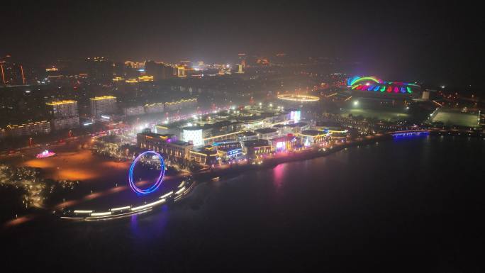 航拍山东荣成樱花湖畔九龙城商厦夜景