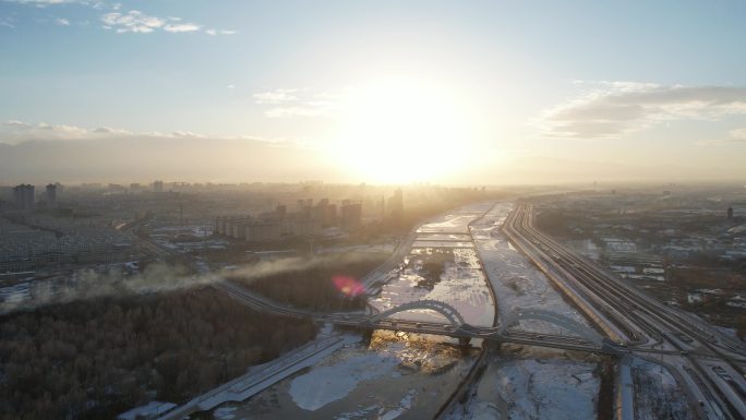 酒泉城市航拍日落冬季冬天雪后建筑