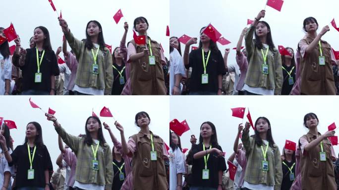 大学活动大学女生挥动小红旗