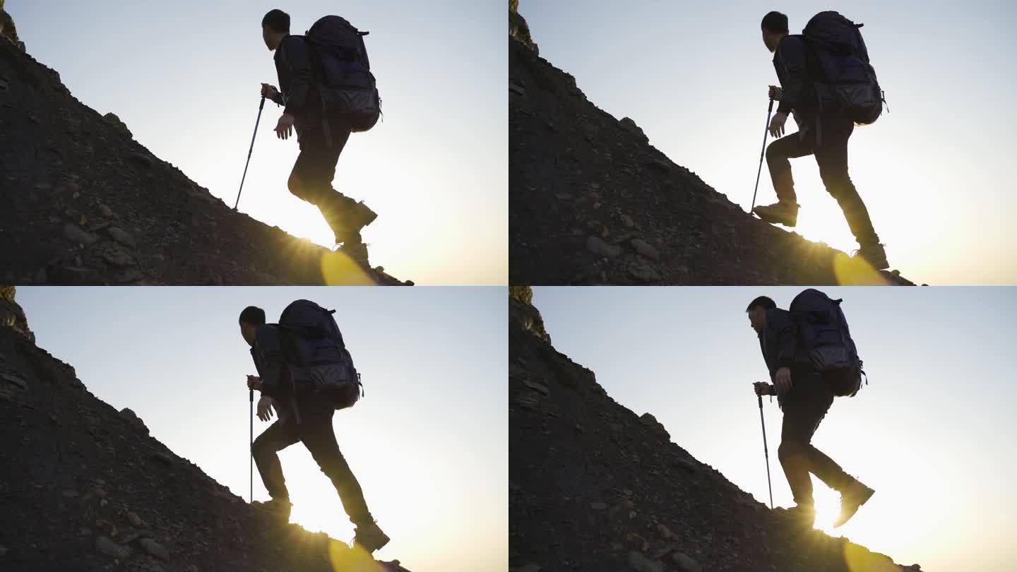 成功人士登山脚步剪影登山杖登山包