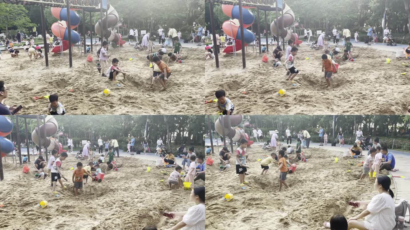 周末亲子城市公园小孩玩沙子