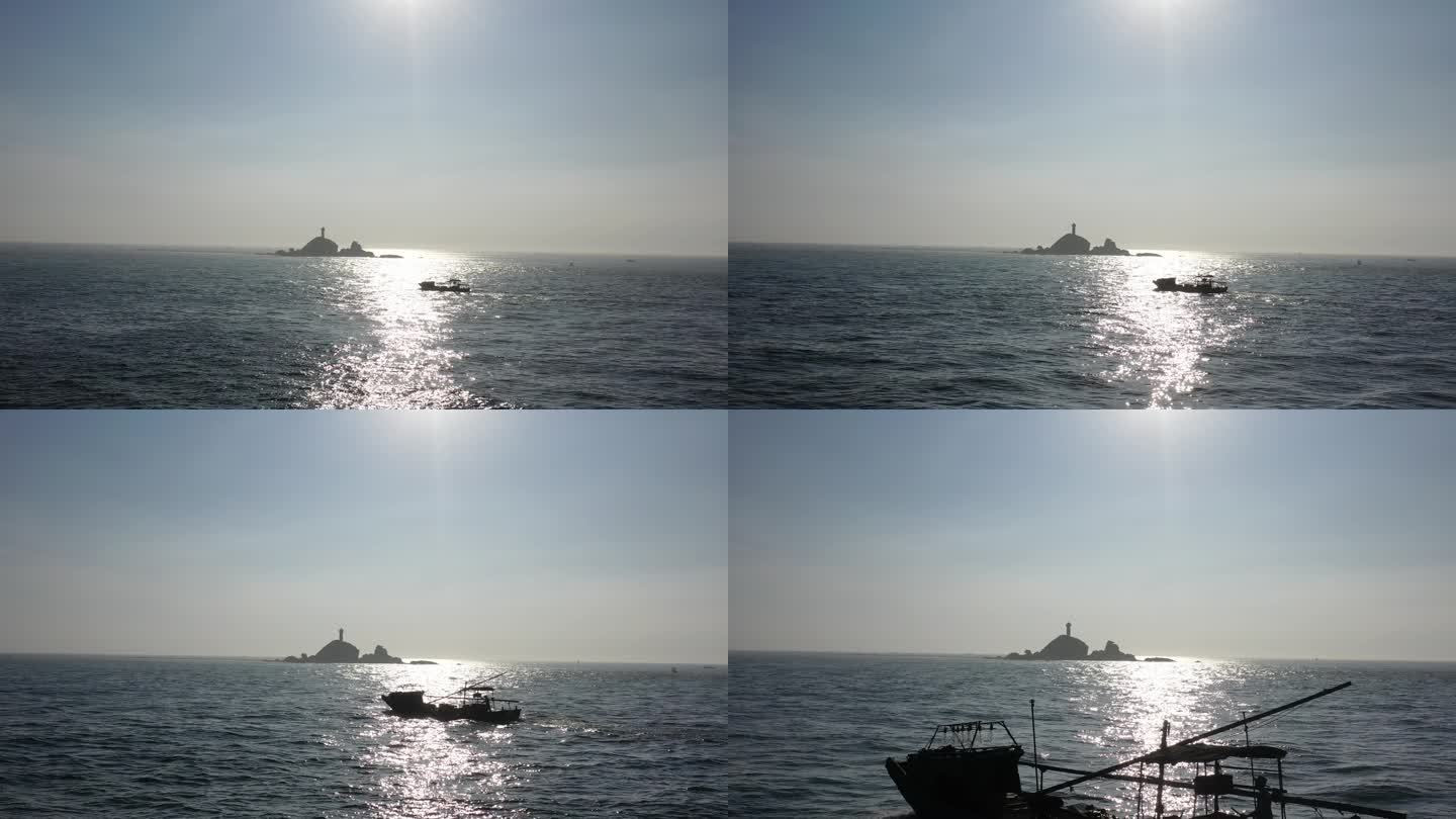 航拍福建东山岛早晨渔船和灯塔