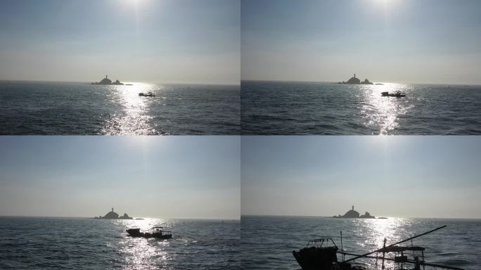 航拍福建东山岛早晨渔船和灯塔