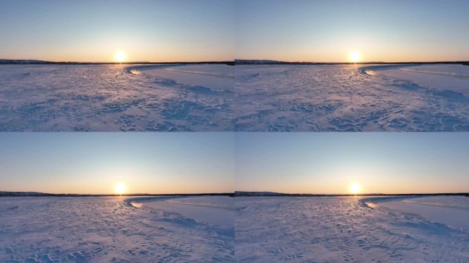 寒冬暖阳夕照雪原白毛风