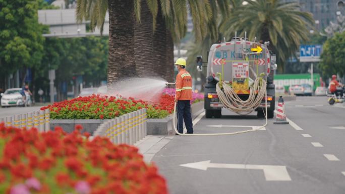 4K实拍环卫工人扫地洒水车清洁马路浇花