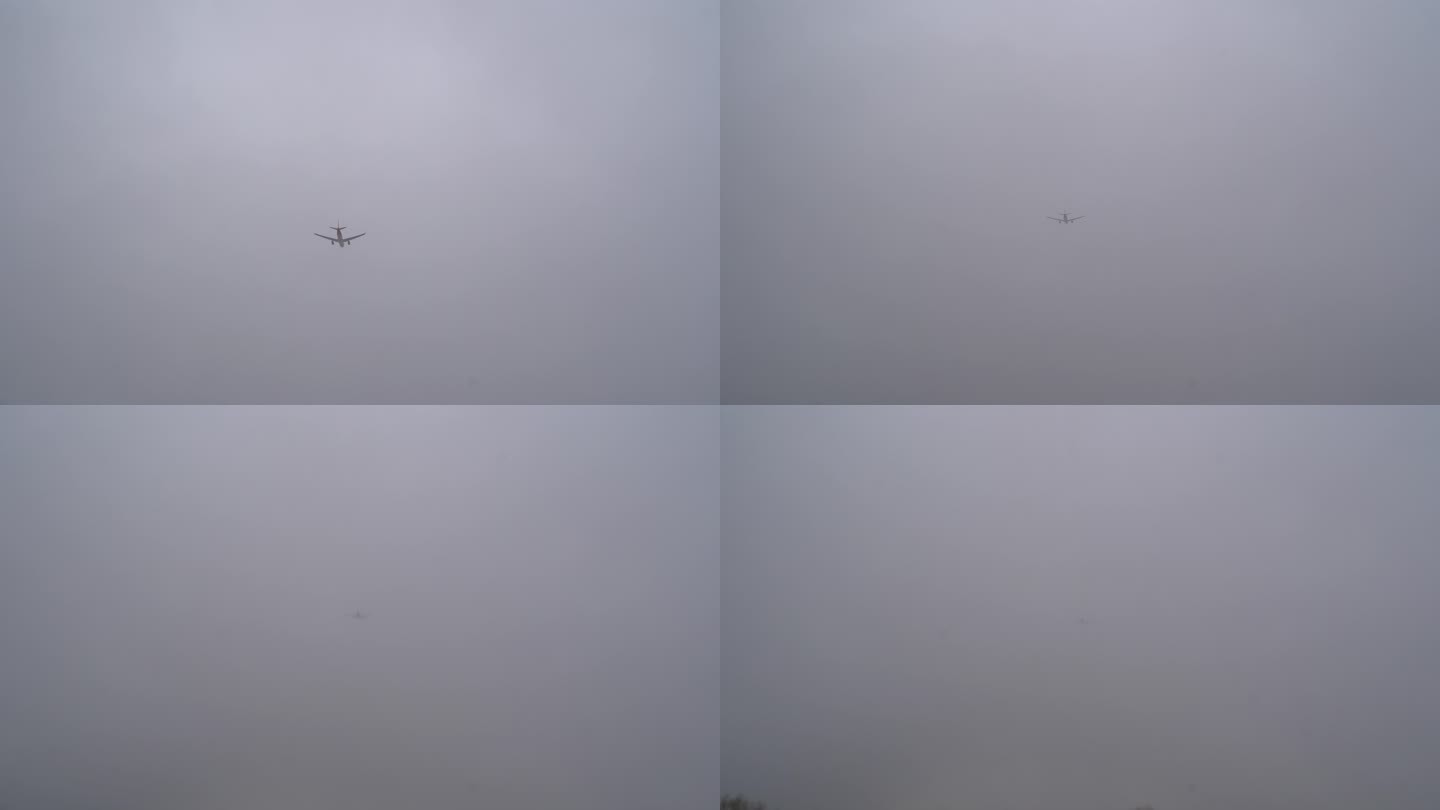 阴天一架飞机飞过头顶飞向远方消失在云里