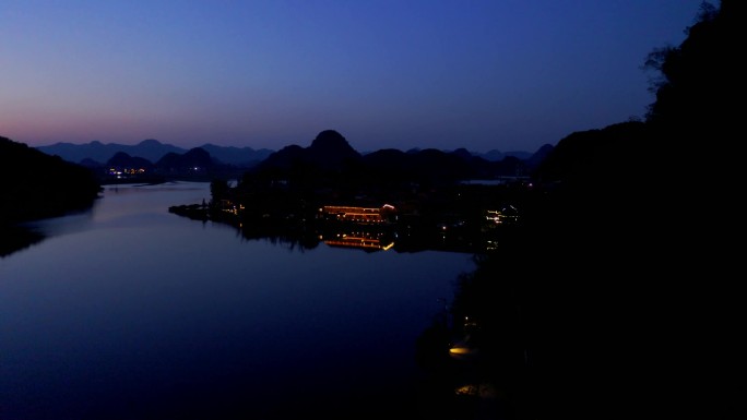 普者黑风景区夜景-仙人洞村晚霞夜景航拍