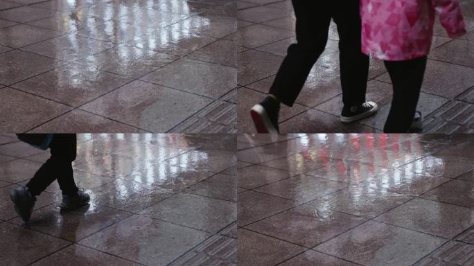 下雨天南京路路面水坑倒影雨点水滴镜面行人