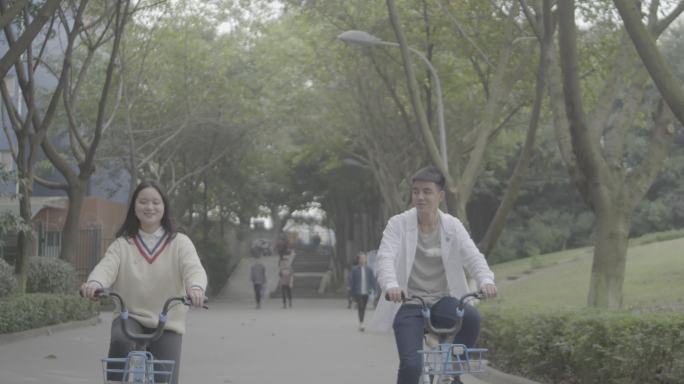 【4K灰度】大学生校园骑单车自行车