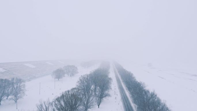 平原大地风雪交加道路公路航拍