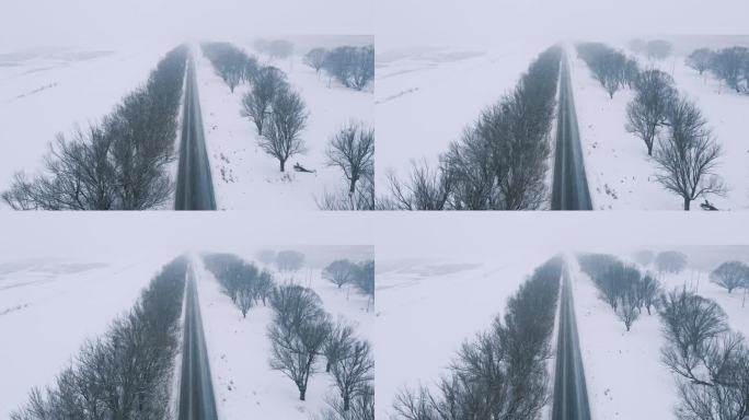 航拍公路平原风雪交加