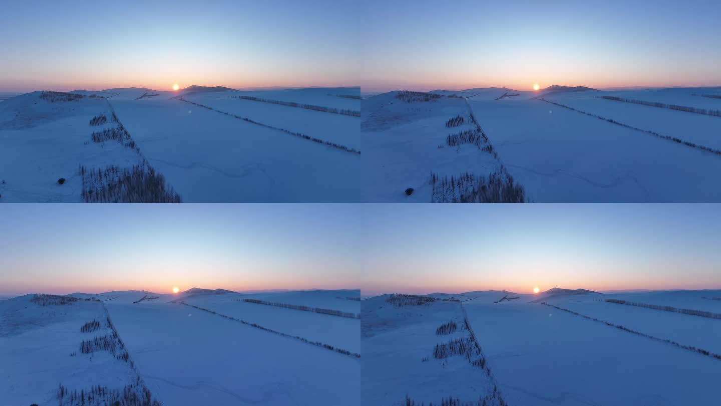 航拍大兴安岭丘陵雪野夕阳