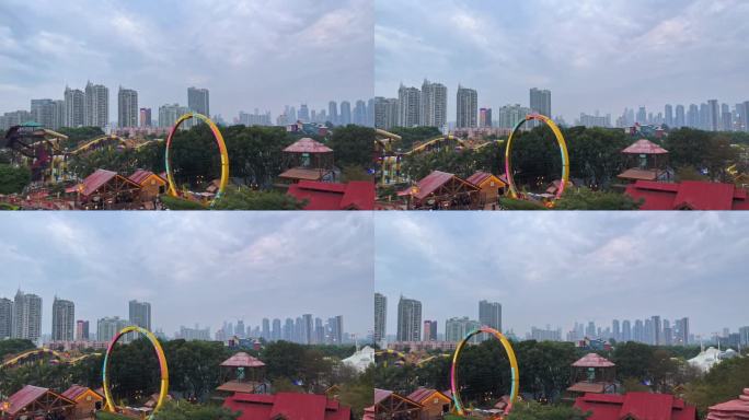 4K高清实拍在游乐场内远眺城市高楼