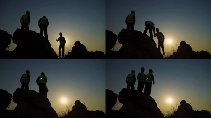 地质队道路勘探团队拉手山顶眺望安全帽探测