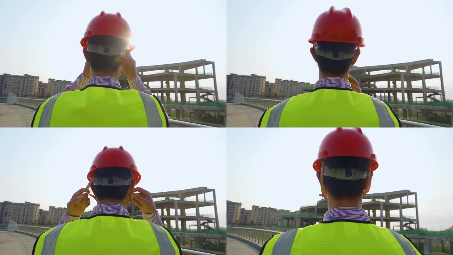 安全施工宣传视频工地戴安全帽工人背影复工