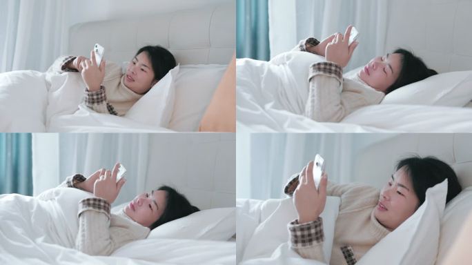 4K年轻女性躺在床上玩手机合集