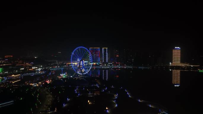 沿江湖边城市公园游乐园摩天轮航拍4k夜景