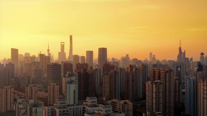 日出时分上海市区高楼林立航拍画面