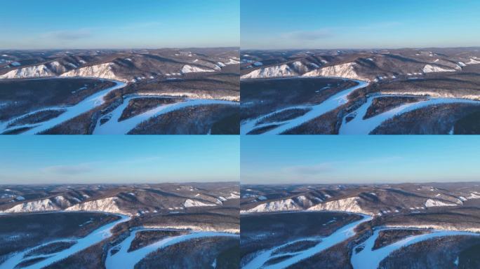 航拍大兴安岭激流河山林雪景