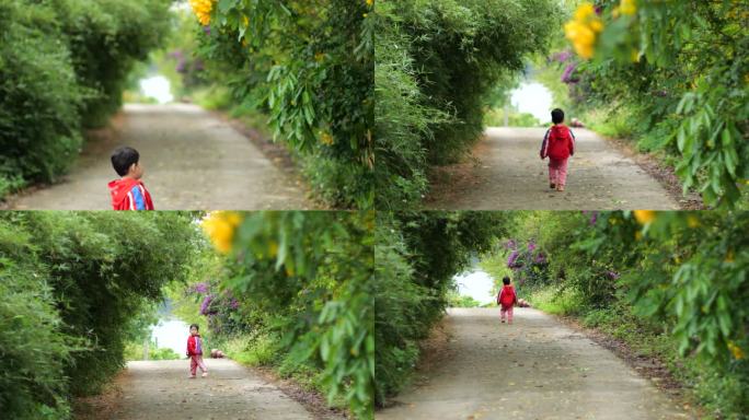 小孩在林荫小道散步