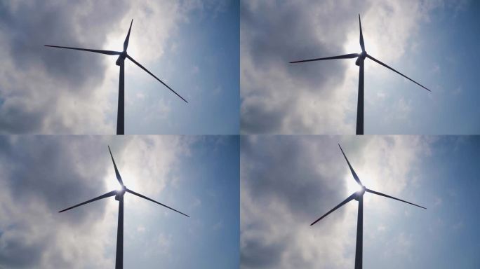绿色能源风能风力发电发风车转动剪影