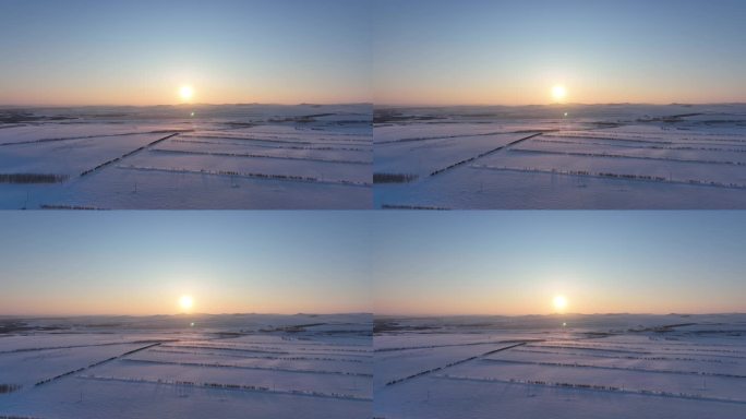 航拍呼伦贝尔冬季雪原夕阳
