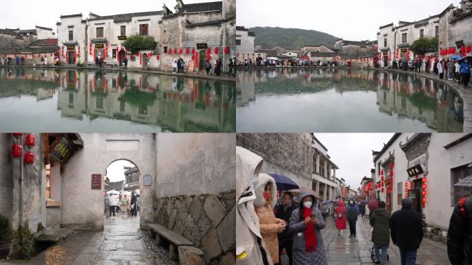 雨天宏村游客