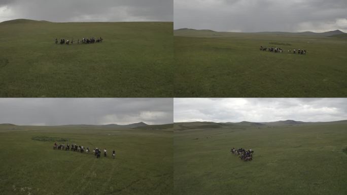 航拍呼伦贝尔大草原马队穿越阴天大风
