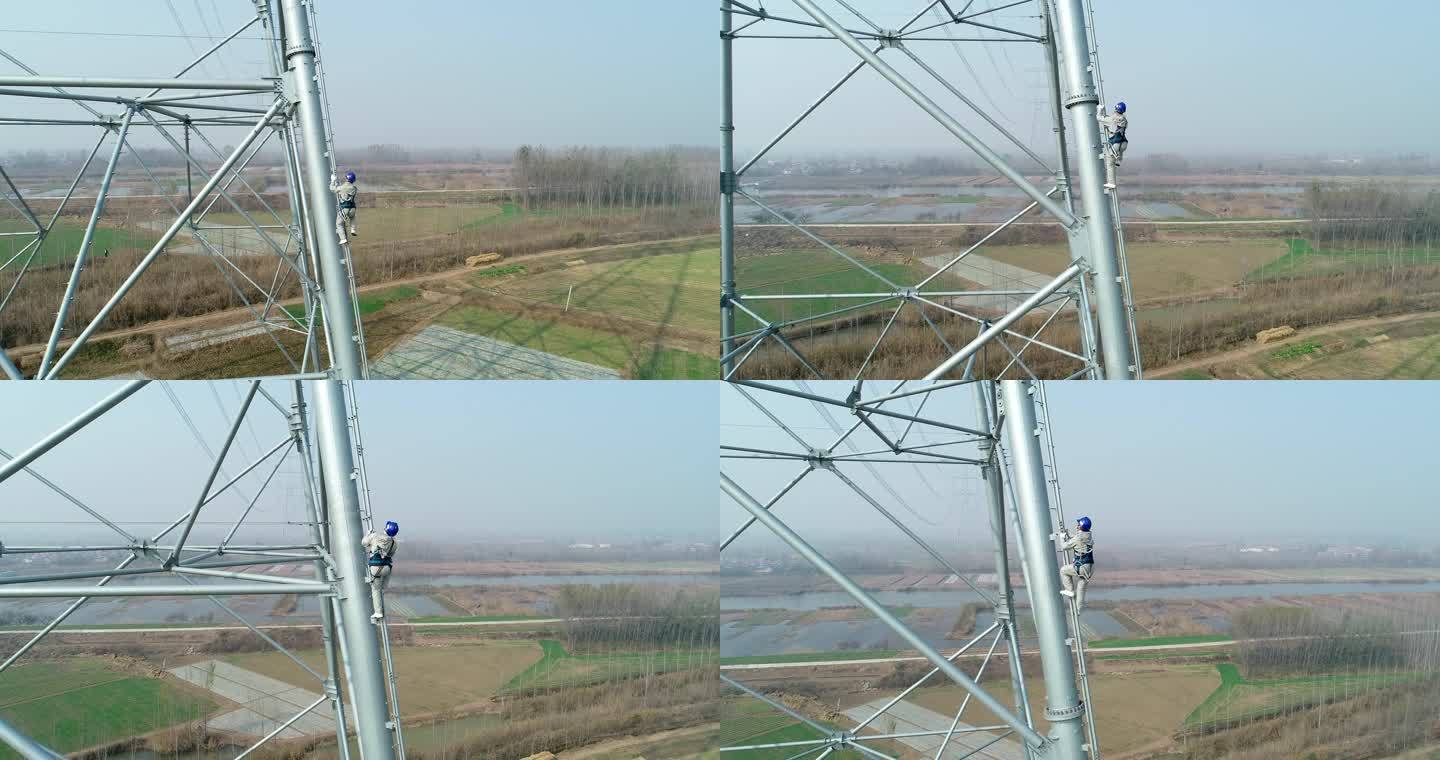 4K航拍电力工人爬上高压电塔